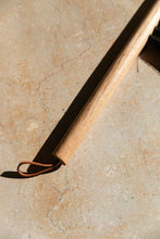 Load image into Gallery viewer, SETTLE | Slow Made Goods - close-up on an oak hand brush with natural bristles against a pale marble background at Settle.