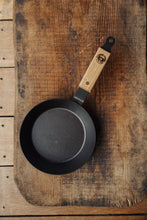 Load image into Gallery viewer, Shop with Settle | Netherton Foundry - overview of a black, hand-spun cast iron glamping pan with wooden oak handle.