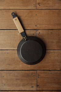 Shop with Settle | Netherton Foundry - overview of base of hand-spun cast iron glamping pan with wooden handle.