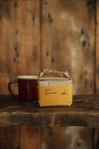Shop with Settle | Harth - enticing little square package of Harth Hot Chocolate, in warming Ginger, with chic ochre-coloured packaging.