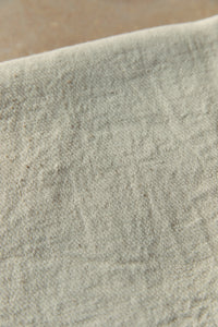 SETTLE | Pico Goods Bath Towel - close-up of handwoven bath towel in natural off-white organic cotton at Settle.