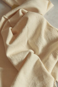 SETTLE | Pico Goods Hand Towel - close-up of a handwoven organic cotton hand towel in a natural off-white at Settle.