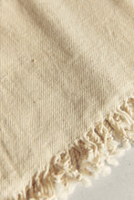 Load image into Gallery viewer, SETTLE | Pico Goods Hand Towel - close-up of a handwoven organic cotton hand towel with tasselled edging in a natural off-white at Settle.
